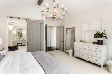 Luxurious bedroom addition featuring a private ensuite addition and customized storage solutions.