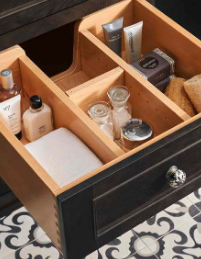 Organized bathroom vanity drawer with divided storage for toiletries and daily essentials