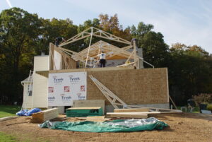 Construction process of garage expansion with framing for master bedroom suite