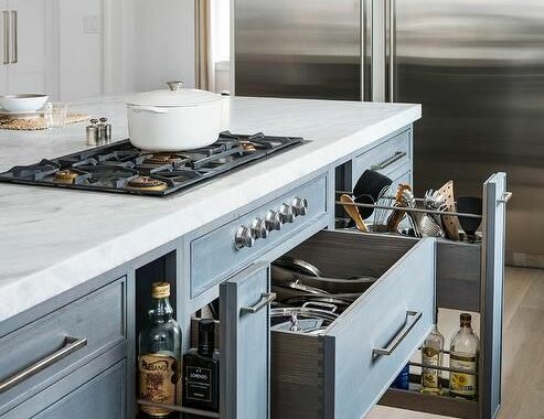 A kitchen with a stove and a counter