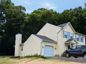 Original single-car garage in Hampstead, MD before garage and master suite addition