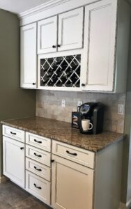 A coffee maker sitting on top of a counter.