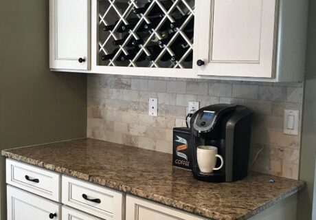 A coffee maker sitting on top of a counter.
