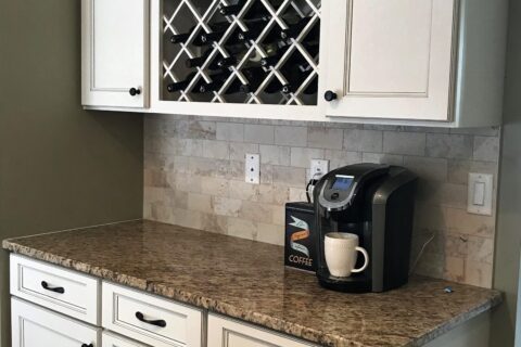 A coffee maker sitting on top of a counter.
