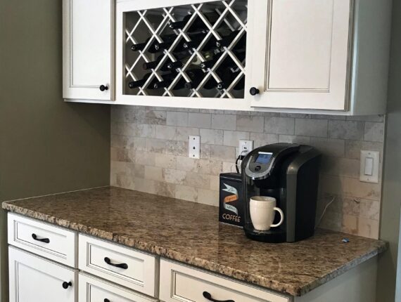 A coffee maker sitting on top of a counter.