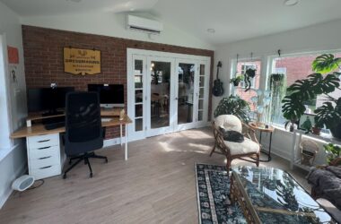 Designing a Home Addition That Improves Daily Living Home addition used as a bright home office and sitting area connected to main house with French doors